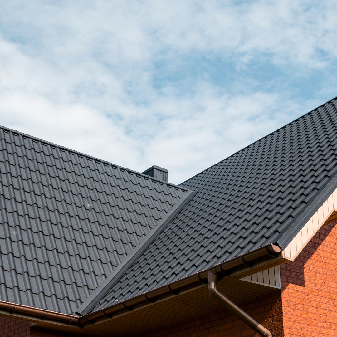 Metal roof on brick house