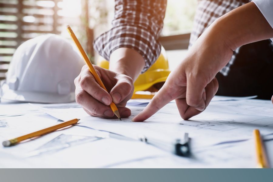 Contractors reviewing plans