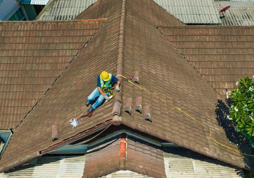 A worker on a roof